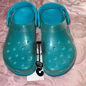 NWT clear top Crocs. Size 5 mens and size 6 woman’s